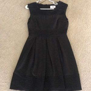Black pleated cocktail dress
